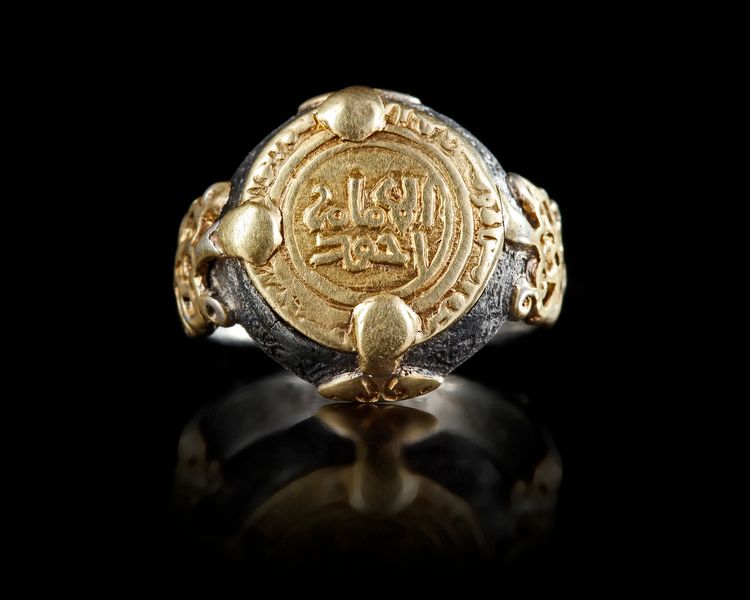 A GOLD AND SILVER RING,12TH CENTURY