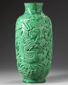 A CHINESE MOLDED GREEN GLAZED 'DRAGON' VASE