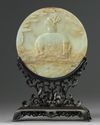 A Chinese celadon jade circular table screen