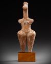 AN AMLASH TERRACOTTA STEATOPHYGOUS FIGURE, CIRCA EARLY 1ST MILLENIUM B.C.