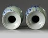 A pair of Chinese celadon-ground blue and white vases