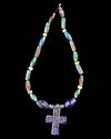 A BLUE GLASS CROSS TRADE BEAD NECKLACE