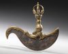 A GILT TIBETAN BRONZE KARTIKA OR VAJRA KNIFE, CIRCA 1900