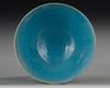 A KASHAN TURQUOISE-GLAZED POTTERY BOWL, PERSIA 12TH-13TH CENTURY