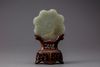 A celadon jade floral plaque