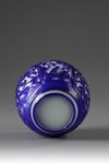 A Chinese blue overlay white glass 'floral' jar