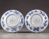 A pair of Chinese blue and white 'Eight Immortals' dishes
