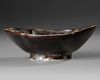 A CHINESE CIZHOU-TYPE BLACK-GLAZED INCISED FOLIATE BOWL, SONG DYNASTY (960-1279)