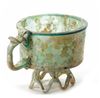 AN APPLIED GLASS FOOTED CUP, PERSIA, 9TH CENTURY
