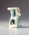 A KASHAN TURQUOISE GLAZED POTTERY OIL LAMP , PERSIA , 13TH CENTURY