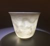 A Chinese white-glazed anhua-decorated 'dragon' cup