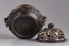 A Chinese parcel-gilt bronze 'sea creatures' censer, cover, and stand