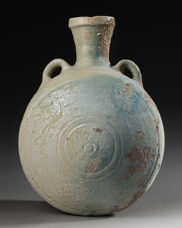 A LARGE PARTHIAN GLAZED PILGRIM FLASK, CIRCA 1ST-2ND CENTURY A.D.
