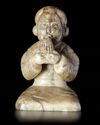 A CREAMY WHITE JADE OF A SHENG-PLAYING MUSICIAN, CHINA, HAN DYNASTY (206 BC-220 AD)