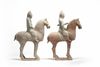 A pair of Chinese pottery equestrians