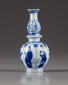 A miniature Chinese blue and white blue and white vase