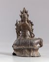 A Chinese bronze Guanyin figure