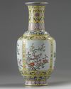 A Chinese yellow ground fmille rose ‘flowers of the four seasons’ vase