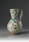 An Iznik pottery jug