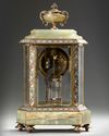 A FRENCH BRONZE AND CHAMPLEVÉ ENAMEL MANTEL CLOCK, 19TH  CENTURY