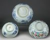 Two Chinese blue and white bowls and a famille rose bowl