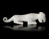 A CHINESE WHITE JADE TIGER, SHANG DYNASTY (CIRCA 1600–1046 BC)