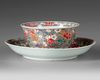 A CHINESE FAMILLE ROSE CUP AND SAUCER, 18TH CENTURY