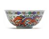 A CHINESE WUCAI DRAGON AND PHOENIX BOWL, QING DYNASTY (1636–1912)