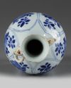 A Chinese blue and white twin-handled slender vase