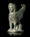 A SEATED BRONZE SPHINX, HELLENISTIC, 1ST-2ND CENTURY BC