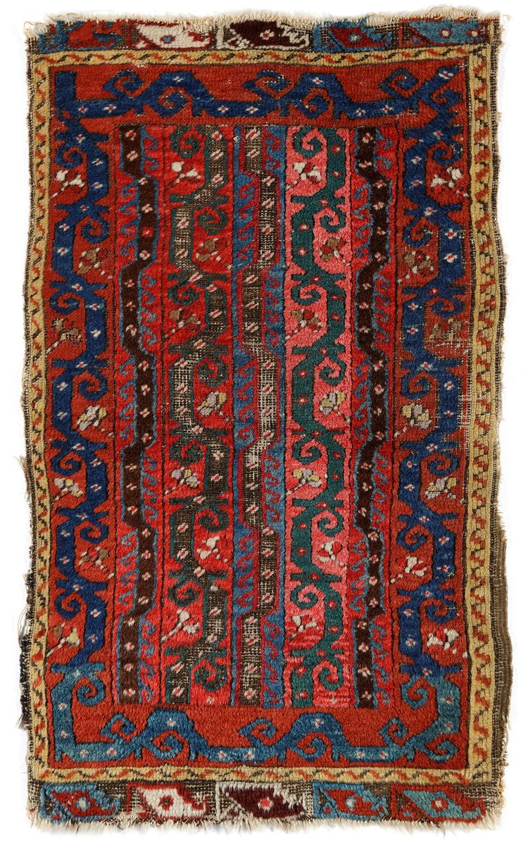 AN ANATOLIAN YASTIK RUG, 19TH CENTURY
