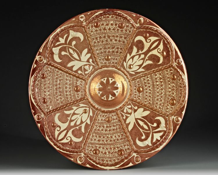 A HISPANO-MORESQUE COPPER-LUSTRE CHARGER, 19TH CENTURY