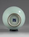 A Chinese pale celadon-glazed slender vase