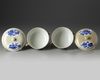 A PAIR OF CHINESE CAFE-AU-LAIT-GROUND BLUE AND WHITE POTICHES AND COVER, KANGXI PERIOD (1662-1722)