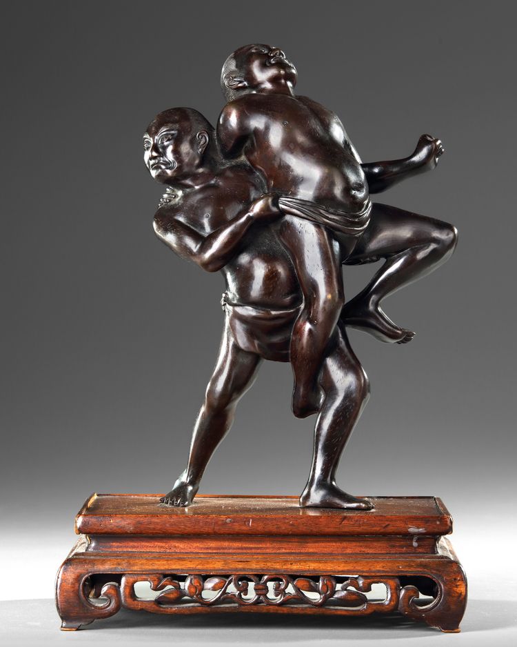 A JAPANESE BRONZE OKIMONO OF TWO SUMO WRESTLERS, MEIJI PERIOD (1868-1912)