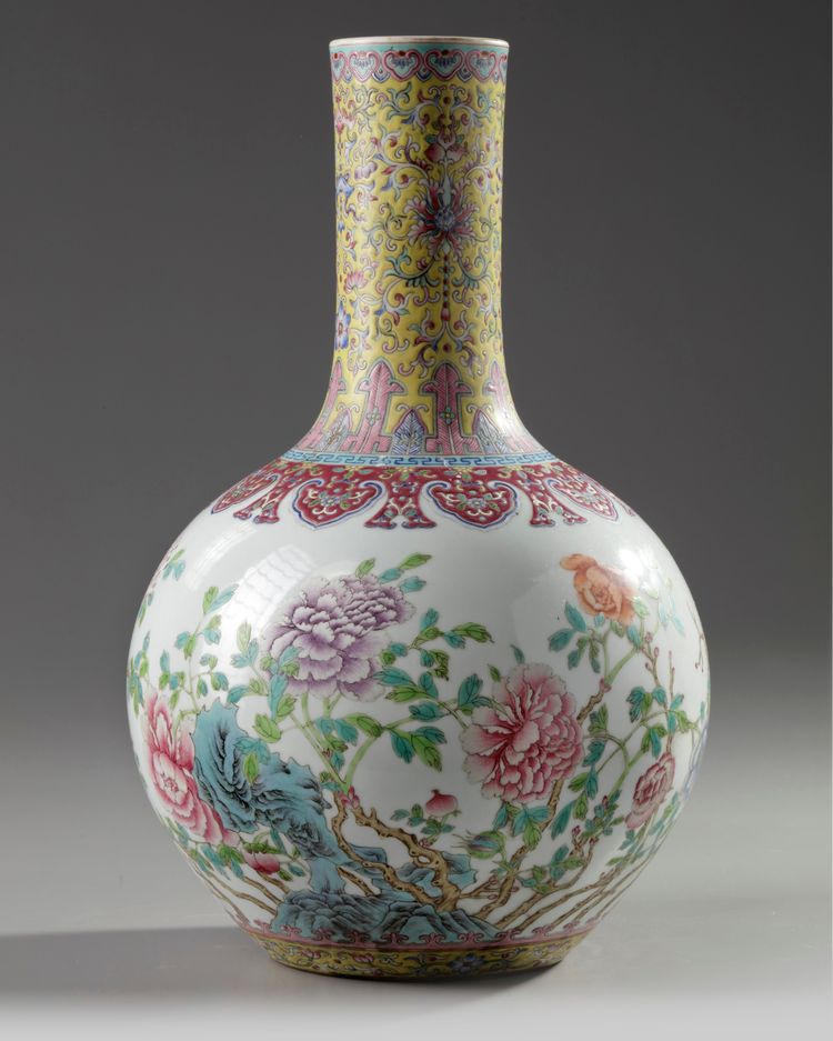 A Chinese famille rose 'peonies' bottle vase