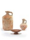 A Chinese pottery jug, a juglet and a stem dish