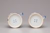 A pair of Chinese powder-blue and famille verte mugs