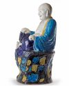 A CHINESE FAHUA GLAZED FIGURE OF BUDAI, CHINA, QING DYNASTY (1644-1911)