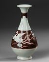 A CHINESE COPPER RED 'PHOENIX' PEAR-SHAPED VASE, YUAN DYNASTY OR LATER
