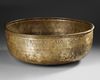 A LARGE AYYUBID SILVER INLAID BRASS BOWL WITH INSCRIPTIONS,  EGYPT OR SYRIA, 13TH CENTURY