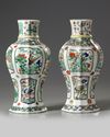 A pair of Chinese moulded famille verte vases