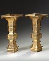 A large pair of Chinese gilt bronze archaistic square-section flaring vases, gu