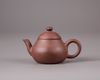 A Chinese yixing teapot and cover