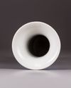 A Chinese blue and white 'prunus on cracked ice' phoenix tail vase