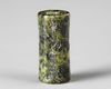 A WESTERN ASIATIC GREEN SERPENTINE CYLINDER SEAL, CIRCA 1900-1700 B.C.