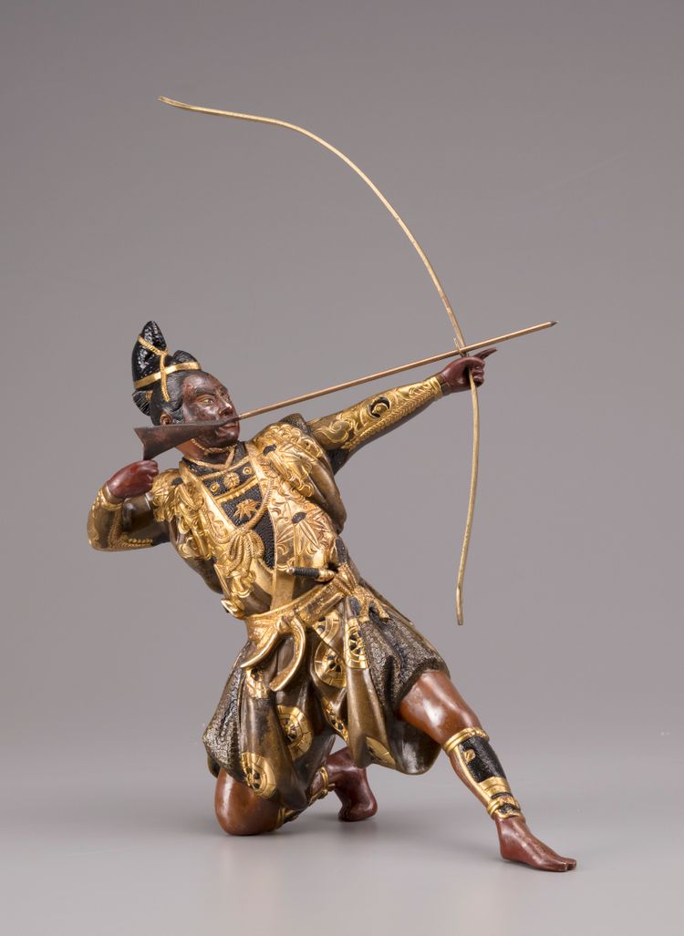 A gilt-bronze figure of a Samurai archer