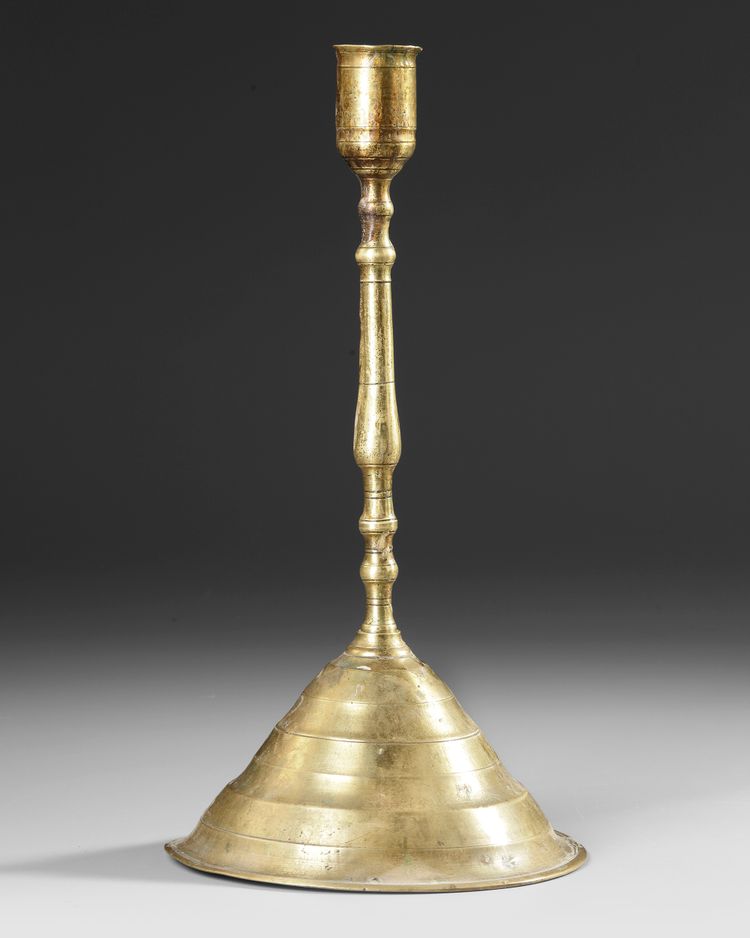 AN OTTOMAN BRASS CANDLESTICK, TURKEY, 17TH-18TH  CENTURY