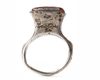 AN ISLAMIC NIELLOED  SILVER RING SET WITH AN INSCRIBED CORNELIAN IN A SQUARE BEZEL, MOSUL AREA, 8TH-9TH CENTURY