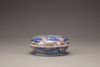 An aubergine-ground blue and white 'dragon' circular box and cover